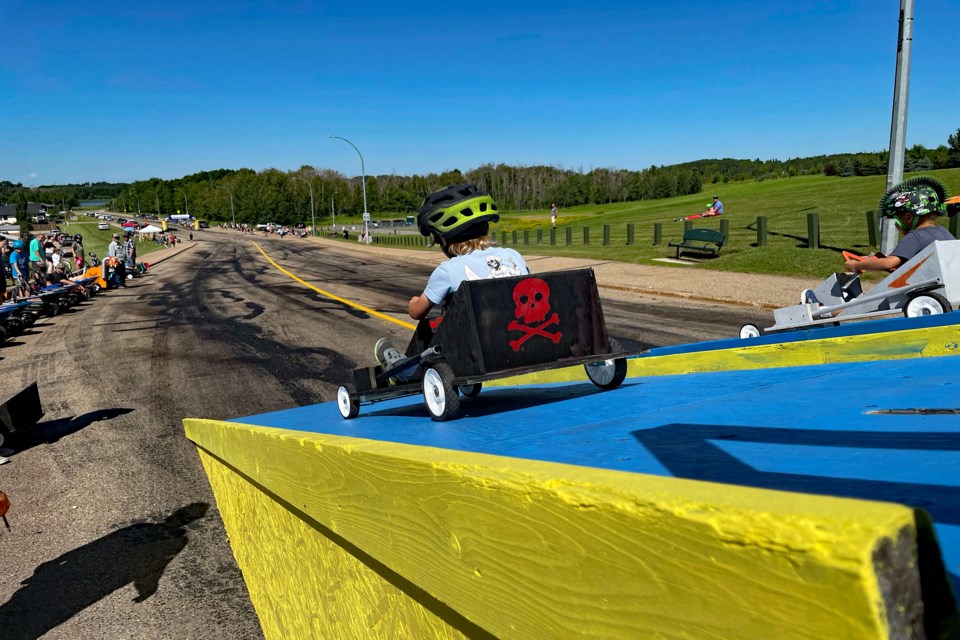 Eager racers at the Innisfail Soap Box Derby blast off the ramp at the top of the hill on 50th Street down to finish line at the bottom. Johnnie Bachusky/MVP Staff