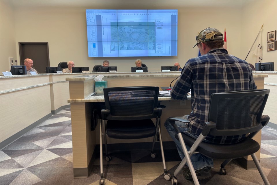 Bob Leney, past-president of the Innisfail Fish and Game Association, makes a presentation to Innisfail town council on Feb. 27 to announce the donation to the town of a new and much larger floating dock for Dodd's Lake; a project that is costing his association and four other groups $20,000. Johnnie Bachusky/MVP Staff