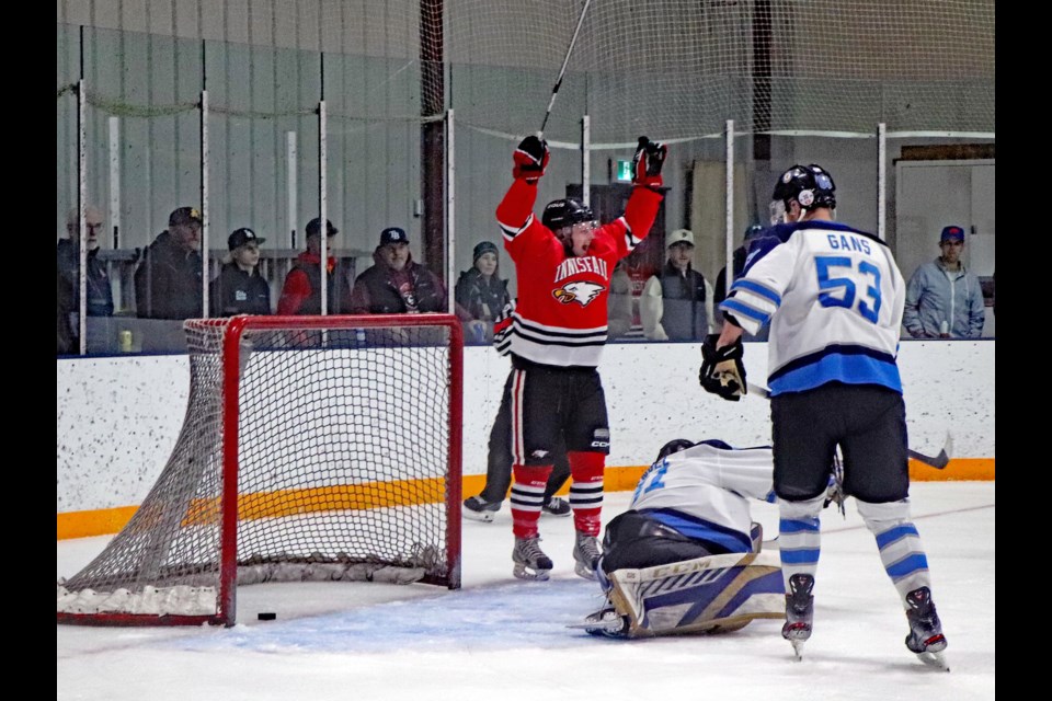 Innisfail Eagles' Riley Simpson celebrates a third period goal by teammate Justin Moltzahn that made the score 4-3. It turned out to be game winner against the Lacombe Generals. The final score was 6-3 that gave the Birds a two to zero game lead in the best of seven North Central Hockey League finals. Johnnie Bachusky/MVP Staff