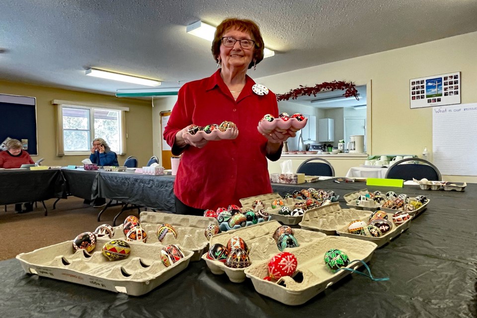 Maryanne Styner, facilitator of The Art of Pysanky Egg Decorating course, holds several completed decorated Ukrainian Easter eggs to show to her class prior to the start of the course at Innisfail's Peace Lutheran Church on April 1. About a dozen local and out-of-town artists and citizens took part in the three-and-a-half hour long IAC-sponsored class to create dazzling Ukrainian Easter egg art. Johnnie Bachusky/MVP Staff