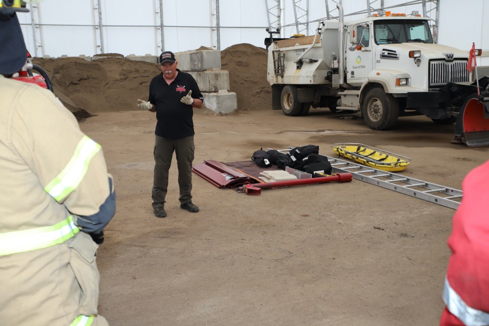 Rescue training specialist Bill McCombs stressed the importance of having the right and safest equipment on hand before trying to go into a bin to rescue a person trapped in a pile of grain.