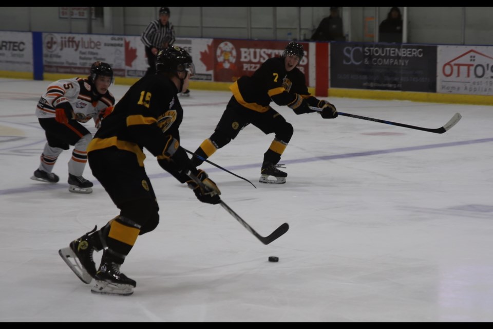 Quinn Abbott of the Olds Grizzlys (7) calls for the puck as teammate Braeden Veldhuizen goes up ice during the Grizzlys game versus the Drumheller Dragons, Dec. 6 at the Olds Sportsplex. 
Doug Collie/MVP Staff