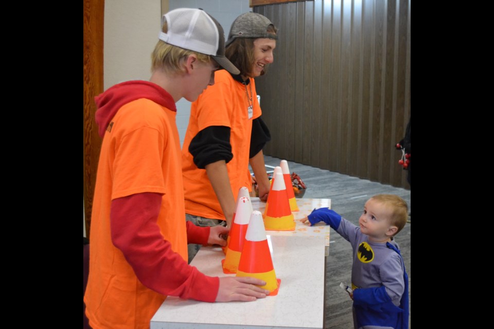 Attendants at the shell game in the Pumpkin Patch got a kick out of the method employed by Maddox Priebe, 2. Rather than wait for the cones containing the candy to be shuffled around, he just went for the one he figured had the candy.