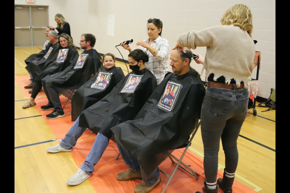 The head shaving begins.
Doug Collie/MVP Staff