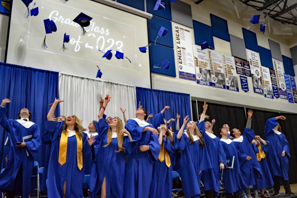 Graduates from the Class of 2023 at Innisfail High School celebrate with the classic traditional mortarboard toss at the end of their graduation ceremony on June 10. Johnnie Bachusky/MVP Staff