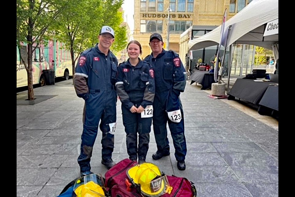 Innisfail fire chief Gary Leith (right) with local firefighters Steven Kennedy and Ella Heistad on June 9 at ground level of Calgary's Brookfield Place, the city's tallest tower at 247 metres, 57 stories, and 1,370 steps. The trio raised about $2,000 in the 10th annual Firefighter Stairclimb Challenge, a fundraiser for Wellspring Alberta. Submitted photo