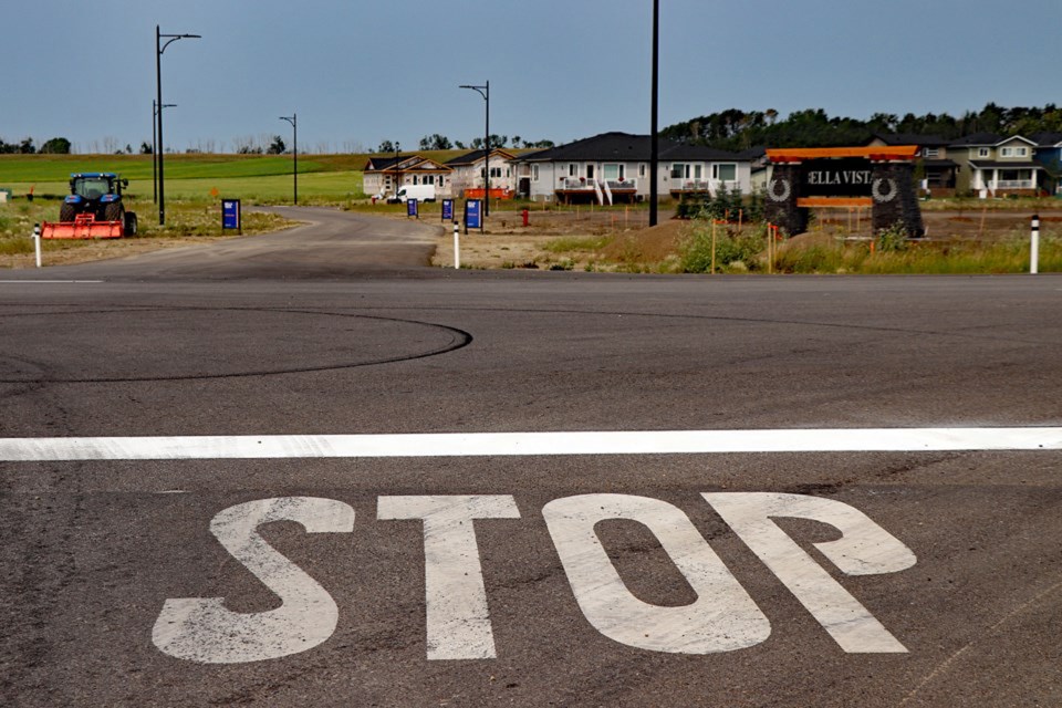 The intersection of Highway 54 and 42nd Street in Innisfail with the growing Bella Vista subdivision in the background. Since 2018 the town has had safety concerns with the 100 km/h speed limit on Highway 54 but is now seeking to expand enforcement authority of community peace officers through an application to the province that will enable them to target speeders. 
File photo/MVP Staff