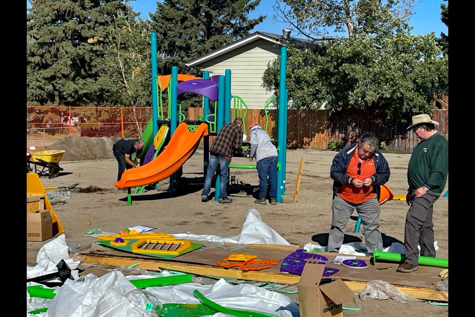 Members of the Innisfail Kinsmen were up bright and early on Sept. 22 to build the long awaited new accessible playground at the westside Mac's/Kinsmen Park. The new accessible facility is the third built in the community since the late summer of 2022. Johnnie Bachusky/MVP Staff