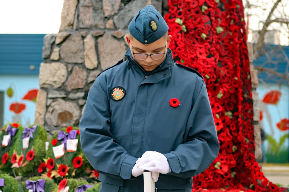 A young cadet from the 7 Penhold Air Cadet Squadron stands guard at the Innisfail cenotaph just before the start of the 2024 Remembrance Day ceremony. Johnnie Bachusky/MVP Staff