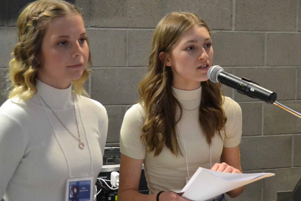 MCs Madison Byrt and Aza Korver address the crowd during the 10th Interact Banquet, a fundraiser held March 22 in the commons at Ecole Olds High School.
Doug Collie/MVP Staff