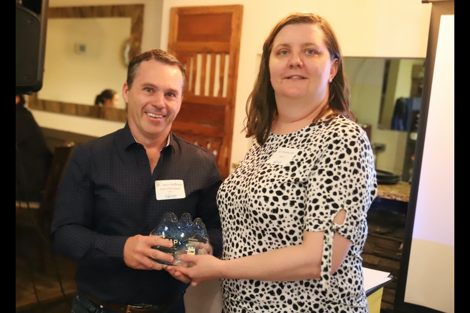 Dr. Jaco Hoffman, left, receives the 2024 Rural Health Professions Action Plan (RhPAP) Rhapsody Physician Award from Dr. Christine Ellis of the Rural Health Professions Action Plan (RhPAP) board of directors.
Doug Collie/MVP Staff