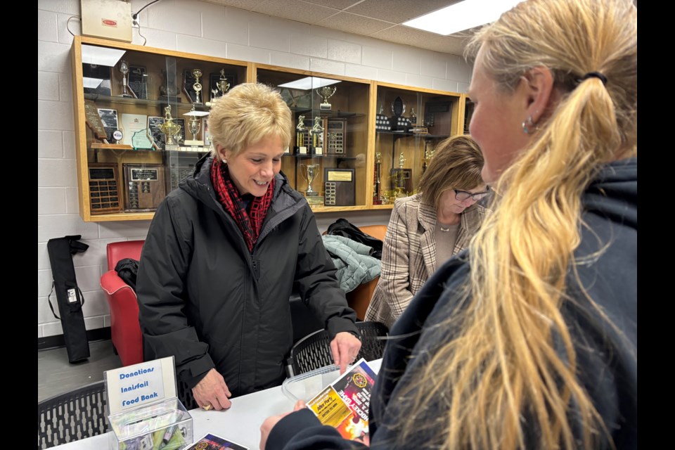 Innisfail mayor Jean Barclay volunteering at the annual Battle of the Badges charity hockey game on Jan. 3 at the Innisfail Twin Arena. Barclay has announced she will seek a second term as mayor when local voters go the polls this fall in the general municipal election. Johnnie Bachusky/MVP Staff