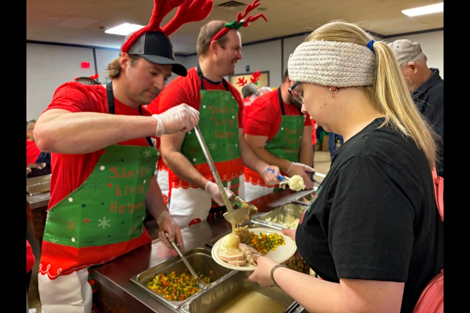 Dozens of Johns Manville employees proudly served hundreds of Innisfailians during the 7th Annual Johns Manville Christmas Community Dinner on Dec. 18 at the Innisfail Royal Canadian Legion Branch #104. Johnnie Bachusky/MVP Staff