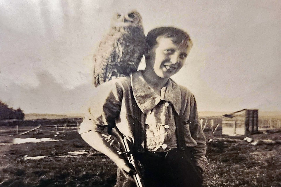 Johnny Robinson in 1929 at the age of 13 with his pet owl Hooty. A Second World War veteran with the 15th Alberta Light Horse Cavalry unit, he had a lifelong passion for nature and wildlife. Submitted photo