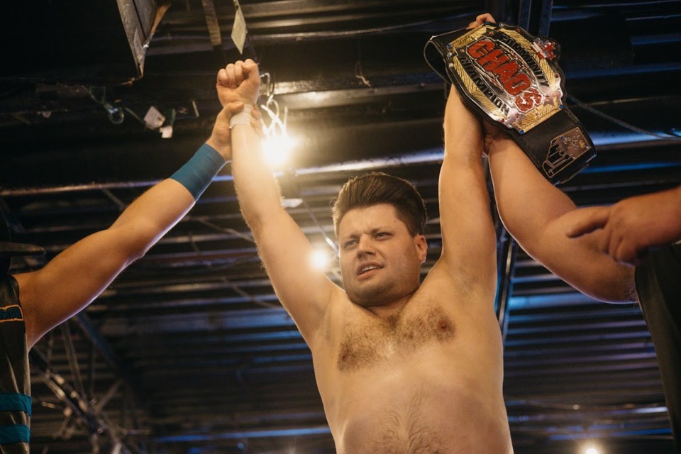 Olds car salesman and wrestler Logan James is the  Can-am Community Chaos champion after he defeated Andy Anderson in a match July 20 in Bulldogs Saloon. 