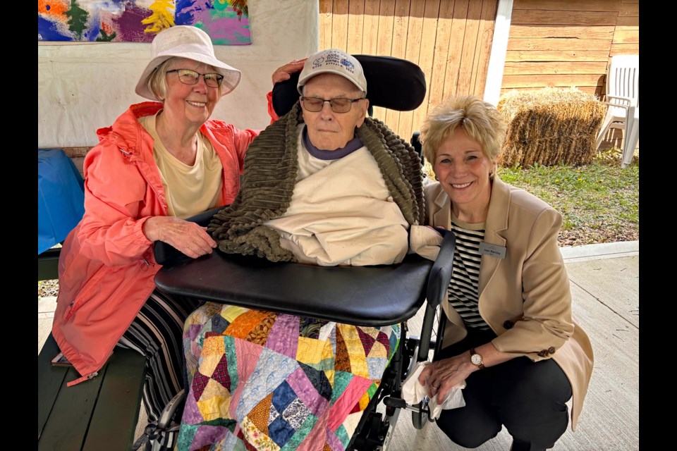 Nyna Marr (left), with her husband Ernest, a resident of Innisfail's Rosefield Centre, and Mayor Jean Barclay at the 46th annual Mayor’s Garden Party at the Innisfail and District Historical Village on June 4. Johnnie Bachusky/MVP Staff