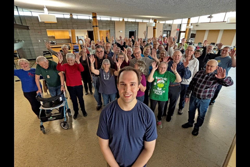 Brad Pawluik, exercise specialist with the Wolf Creek Primary Care Network, comes to the Innisfail Library/Learning Centre three times a week to lead  special healing exercises for more than 50 citizens in the Movers and Groovers program. Johnnie Bachusky/MVP Staff