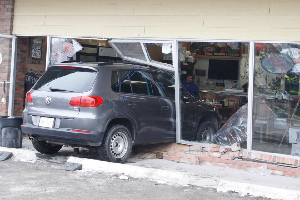 The 80-year-old driver of this Volkswagen Tiguan was not hurt after driving into the building housing Kodiak BBQ & Deli on Tuesday, Jan. 28.
Simon Ducatel/MVP Staff