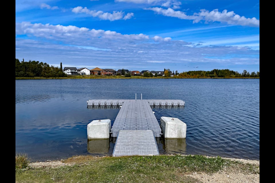 Dodd's Lake has a new and larger new $19,000 dock that can be in place in the lake year-round. The dock project for the lake was spearheaded by the Innisfail Fish and Game Association.  Johnnie Bachusky/MVP Staff