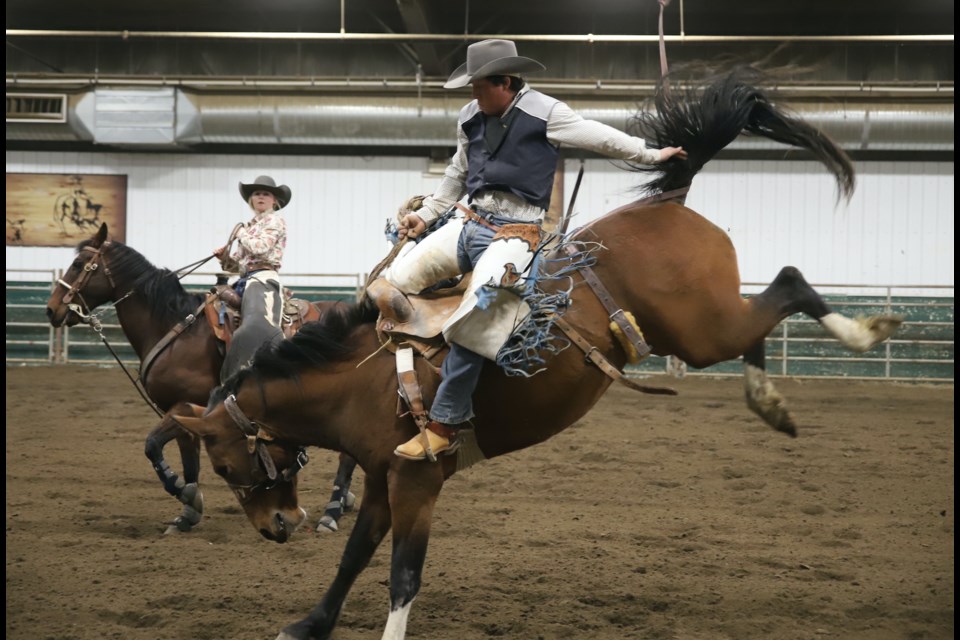 A rider tries to hang on during a fall rodeo held Oct. 21-22 at the Olds College of Agriculture & Technology. The rodeo was one of several activities held or underway this week during the ninth annual Make Some Noise for Mental Health campaign, presented by the Royal Bank of Canada and hosted by the Alberta Colleges Athletics Conference.   