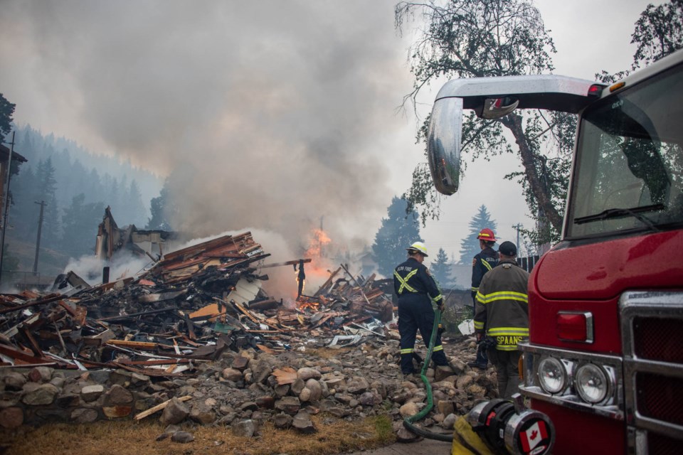 Deputy Fire Chief Stephanie Bibault and Lt Thompson attend a fire in Jasper.
Photo courtesy of the Olds Fire Department