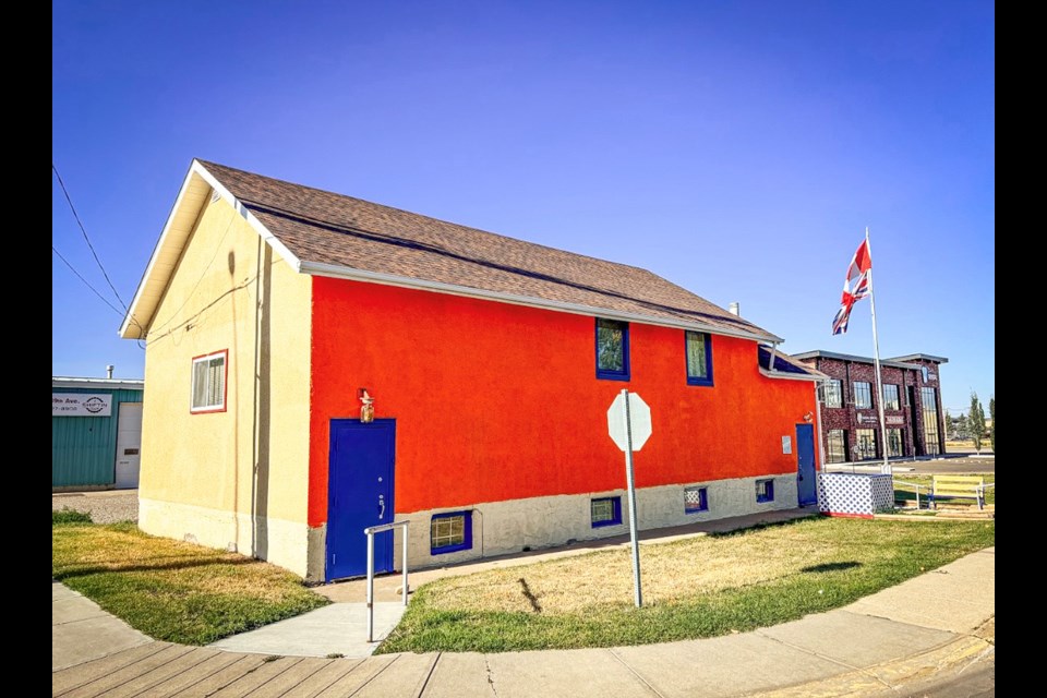 The south side Innisfail's Orange Hall with its fresh coat of orange paint. The service club is hoping to get more painting done before winter with the launch of its Paint the Hall Orange Fund. Johnnie Bachusky/MVP Staff