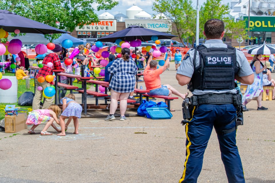 Innisfail RCMP, along with private security, kept a close but respectful watch during most of the five and half hour long outdoor 2023 Innisfail Pride festival on June 24. While there were a few "unwanted guests" who made brief appearances, organizers and police said the  event was peaceful and without any negative incident. Photo by Candice Hughes