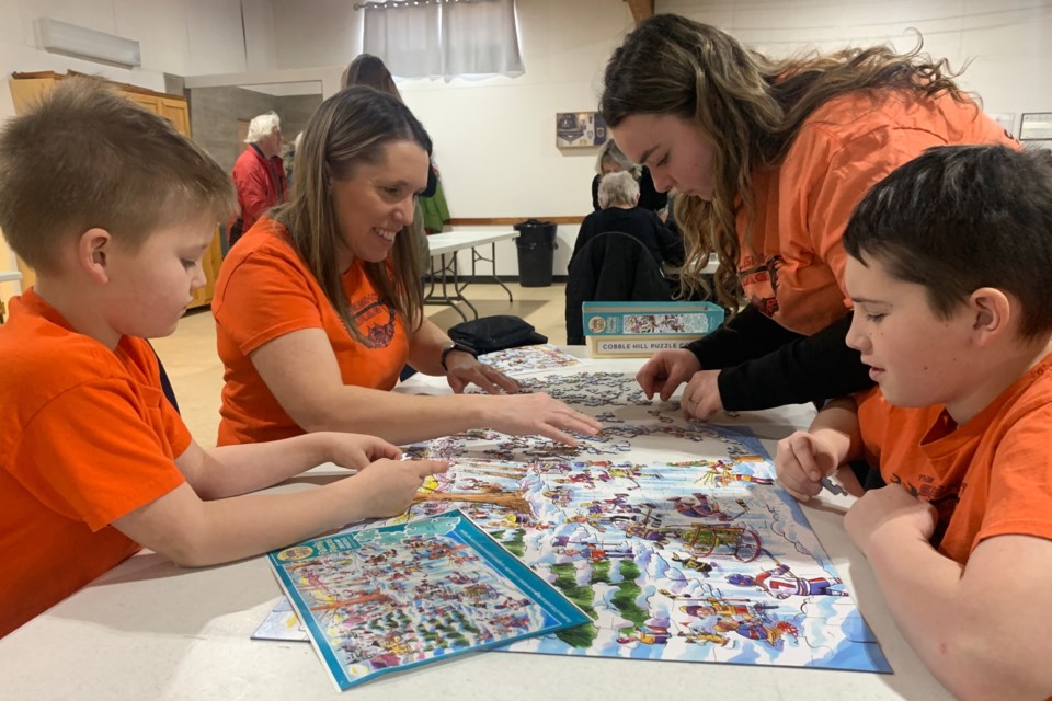 Mom Shawna Brackley teamed up with her kids Casey, Milez, Kingzley for the second annual Puzzlepalooza that was organized by Greenwood Neighbourhood Place and hosted at the Sundre Elks Lodge No 338 on Sunday, Feb. 16 amid the Family Day long weekend's Winterfest 2025 activities. 
Simon Ducatel/MVP Staff