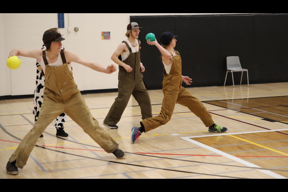 Students get ready to throw during a dodgeball tournament, held Dec. 9 at the Olds College of Agriculture & Technology. 