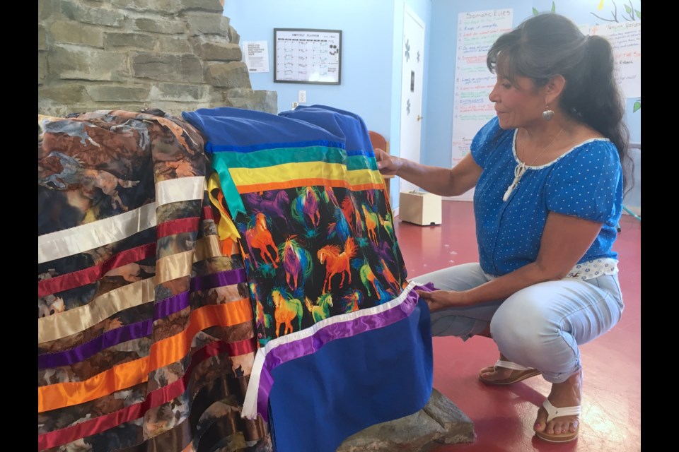 Pam Piché Lashmore, a Métis resident of the Water Valley area whose Métis father Harvey Piché was from the Sundre area, was invited to provide on Saturday, June 10 an introduction to making ribbon skirts at the Sundre & District Museum. The activity was a local initiative partly funded by Family & Community Support Services and organized through Greenwood Neighbourhood Place Society to recognize and celebrate National Indigenous Peoples Day, which this year is officially on June 21. 
Simon Ducatel/MVP Staff