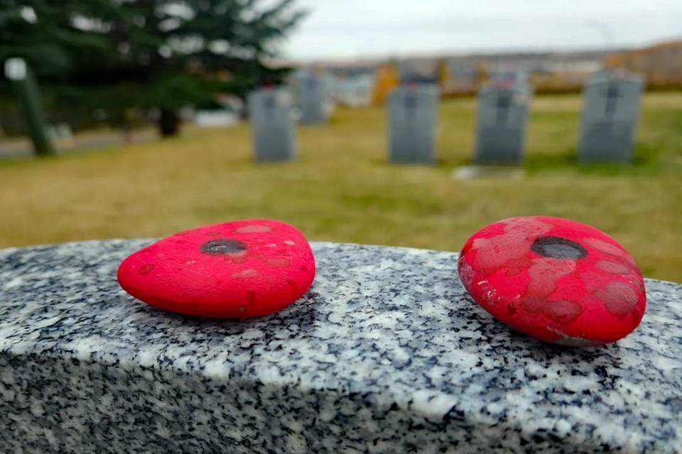 On Oct. 20 the entire student body of more than 300 students from Innisfail's St. Marguerite Bourgeoys Catholic School participated in their own No Stone Left Alone program at the Innisfail Cemetery to honour Canada's war-time heroes. 
Submitted photo