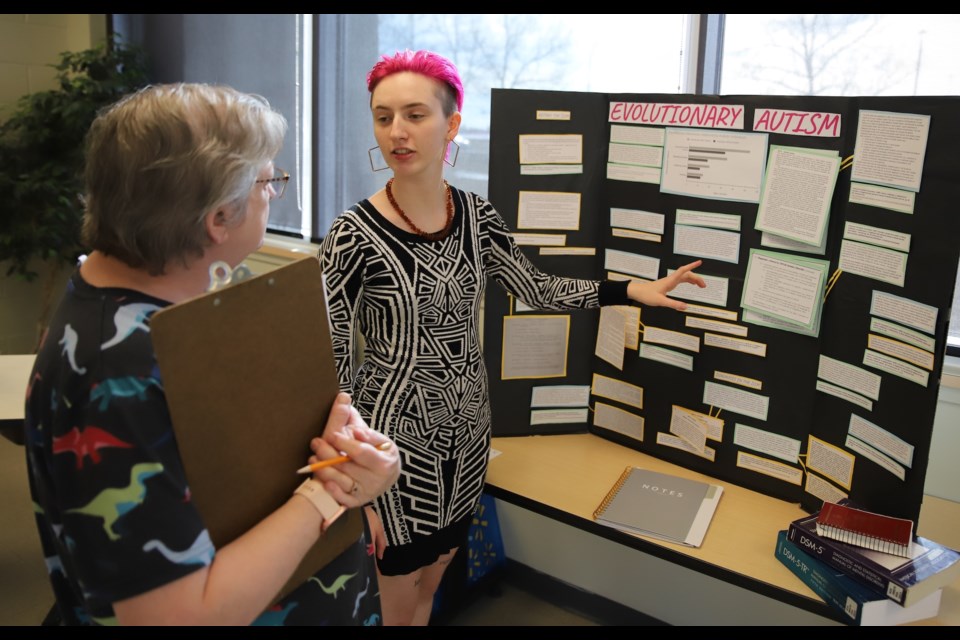 École Olds High School Grade 10 student Oceana Jones discusses her project Evolutionary Autism with a judge.
Doug Collie/MVP Staff