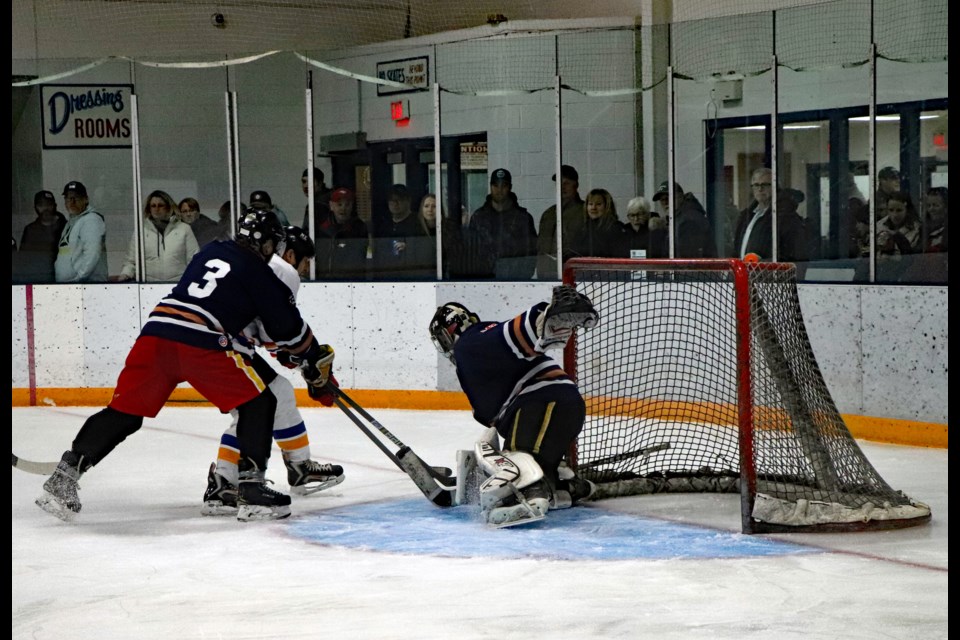 Action on the ice during the inaugural Battle of the Badges last Jan. 6 was fierce and competitive with the Innisfail RCMP ultimately winning  the game 15 – 10.  
File photo/MVP Staff