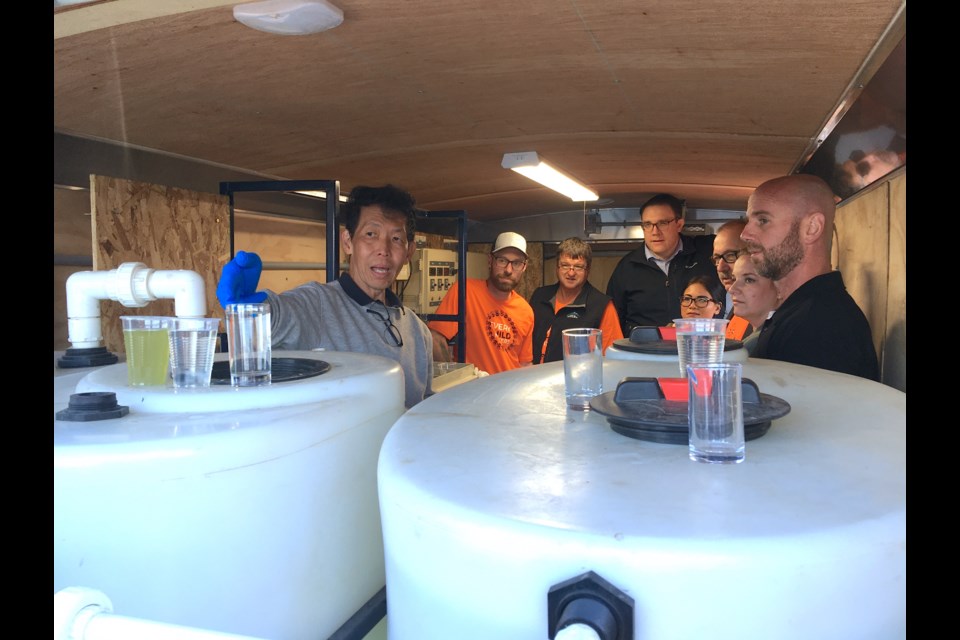 A miniature mobile technology demonstration was deployed on-site as part of the groundbreaking ceremony. Here, project engineer Gonzales Lee, Soneera Water's vice-president of technical services who essentially designed the system, said the method involves using electrochemical induction to separate waste from water, a process that reportedly treats water in an hour or less, as compared with months on a traditional lagoon system.
Simon Ducatel/MVP Staff