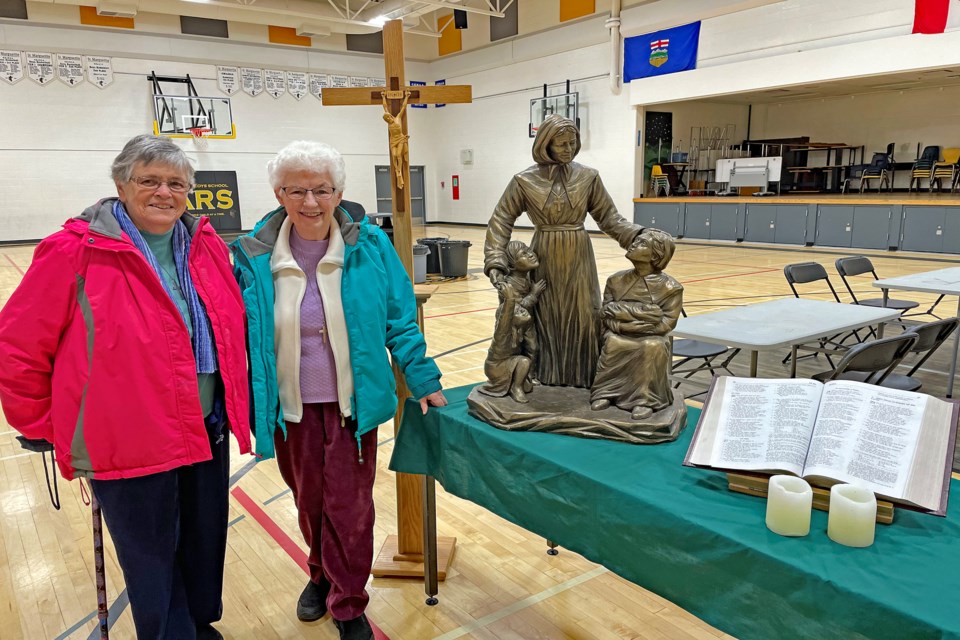 Sister Paula Maher, left, and Sister Marie Clarkin at Innisfail's St. Marguerite Bourgeoys Feast Day on Jan. 12. Despite the diminishing numbers of the Congregation of Notre Dame sisters from Montreal they remain committed to serving the spiritual needs of Innisfailians. Johnnie Bachusky/MVP Staff