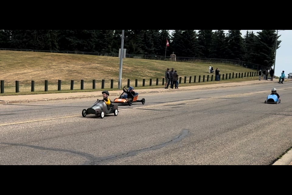 Brody Feduniw in the lead for his record race at the fourth annual Innisfail Soap Box Derby. Photo by Cale Feduniw