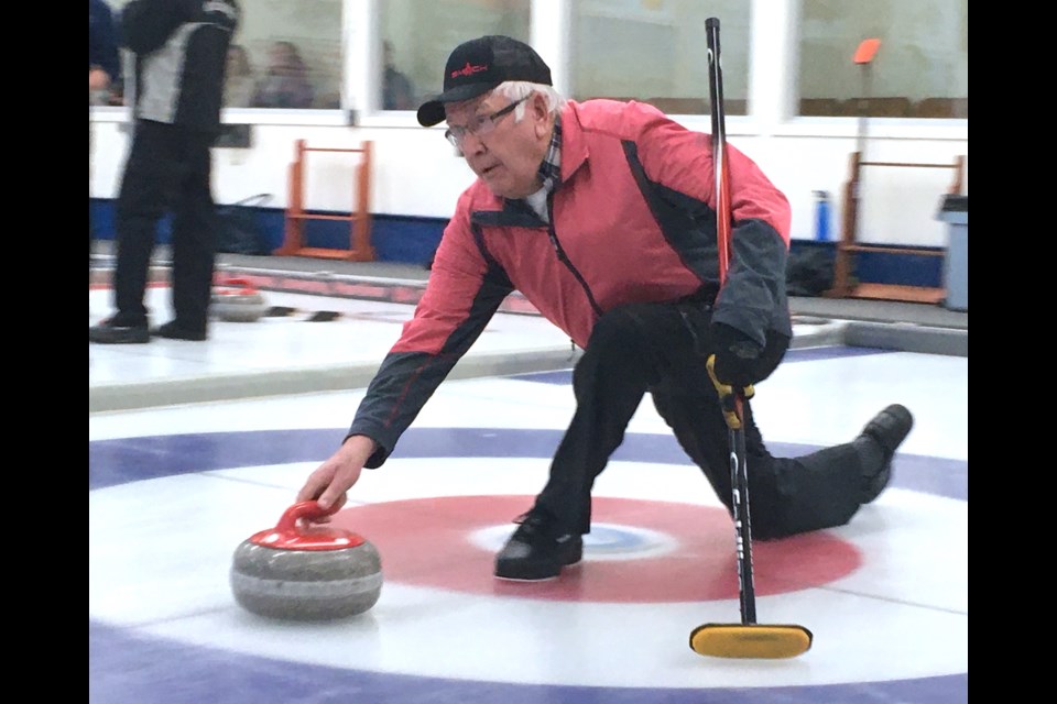 Veteran curler Nels Brian, who skipped a rink from Cremona, releases a rock on Saturday, April 1 during the day's opening draws at the Sundre Curling Rink for the 2022-23 season's windup bonspiel. 
Simon Ducatel/MVP Staff