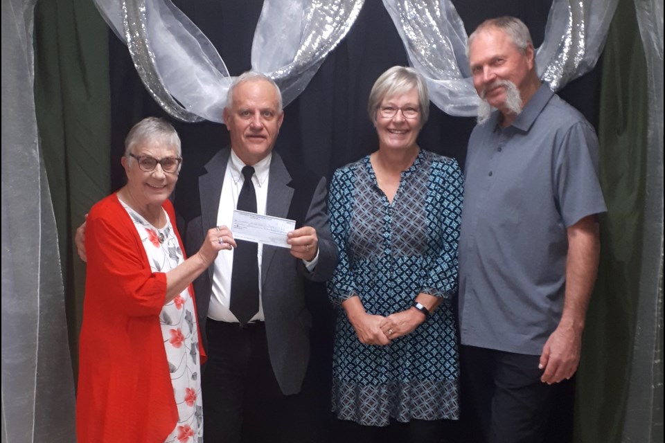 From left: Vi Ellithorpe, Sundre Hospital Auxiliary president, and Gerald Ingeveld, Sundre Hospital Futures Committee chair, with Erna and Allan Karsten, who presented a substantial $18,000 donation from the Bert Visser estate to help kick off the committee's 2023 capital campaign to raise funds for a new portable X-ray unit that has a roughly $200,000 price tag. The estate had also previously contributed funding toward the capital campaign that paved the way for new, state-of-art heart monitors. 
Submitted photo