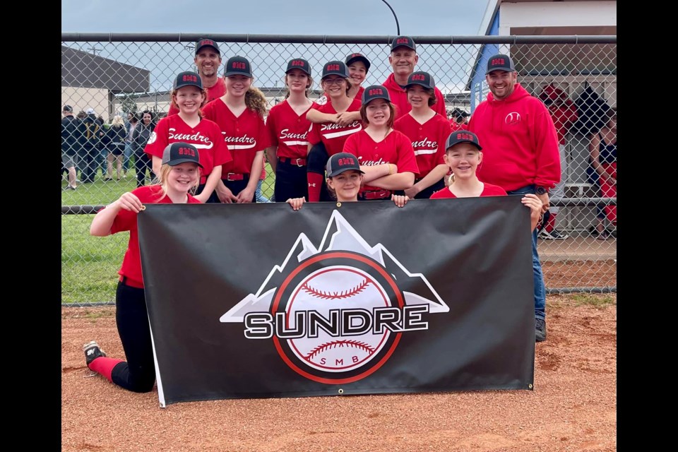 The Sundre U13 Red Devils in July headed to provincial semifinals in their pool's first place, but were unable to maintain that momentum. The squad, which had previously secured a spot in provincials after becoming Zone 2 champions following a three-game win in the Didsbury Regional Playoffs, missed a top-three finish after coming up a little short in the bronze medal match. But the players nevertheless brought home plenty of great memories with no shortage of optimism for next year. 
Photo courtesy of Sundre Minor Ball Facebook