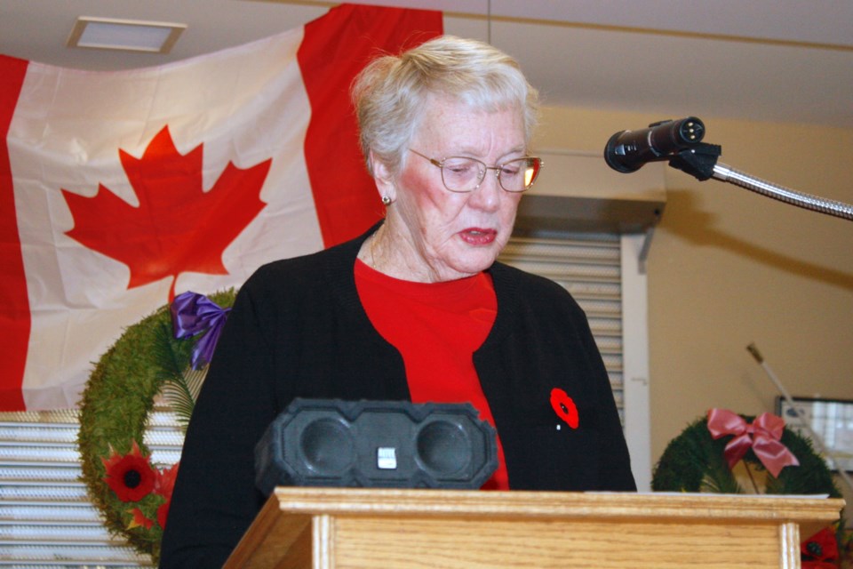 IN FLANDERS FIELDS – A few members of the Royal Canadian Legion Branch #223 in Sundre brought an early Remembrance Day service on Thursday, Nov. 7 for residents at the Sundre Seniors’ Supportive Living centre following visits to both River Valley and Sundre High schools as well as the Myron Thompson Health Centre. Lodge resident Betty Edwards (née Nicklin), who served as a fighter control operator with the RCAF from 1958-60, recited John McCrae’s In Flanders Fields during the ceremony.
Simon Ducatel/MVP Staff