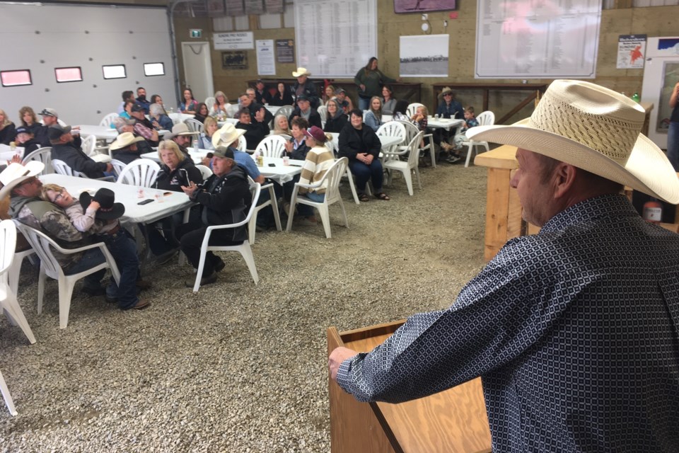 Shane Crouch, president of the Sundre Rodeo and Race Association, addresses dozens of people on Sunday, June 2 at the Wild Horse Saloon during a sponsors’ recognition barbecue. The big unveiling revealed that a $125,000 grant from the provincial government’s Community Facility Enhancement Program will go toward a major expansion of a covered VIP seating area for sponsors. Simon Ducatel/MVP Staff