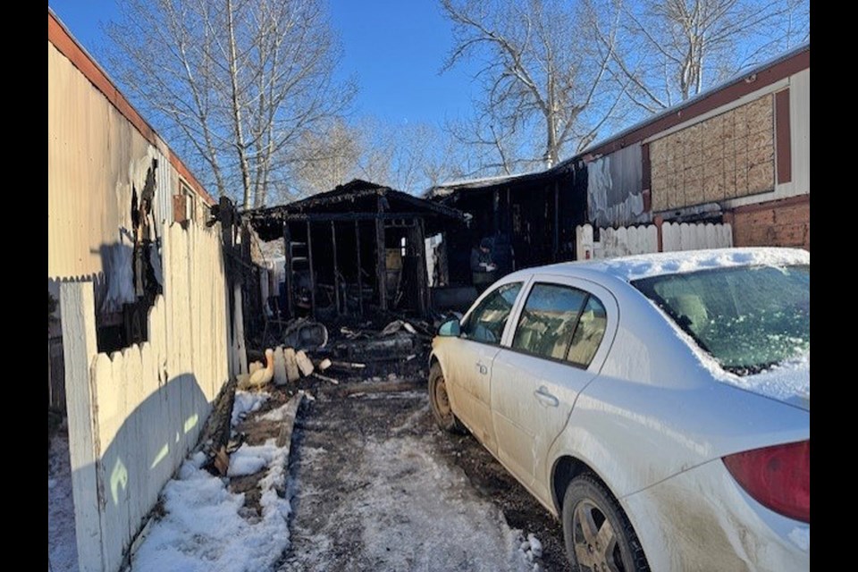 Fire damage was extensive on Jan. 6 to a mobile home at 43 Westwood Court in the town’s westside Westwood Court Mobile Home Park. The home's 69-year-old occupant and her canine were rescued by an Innisfail peace officer after being trapped by the fire and a blocked back door. Submitted photo