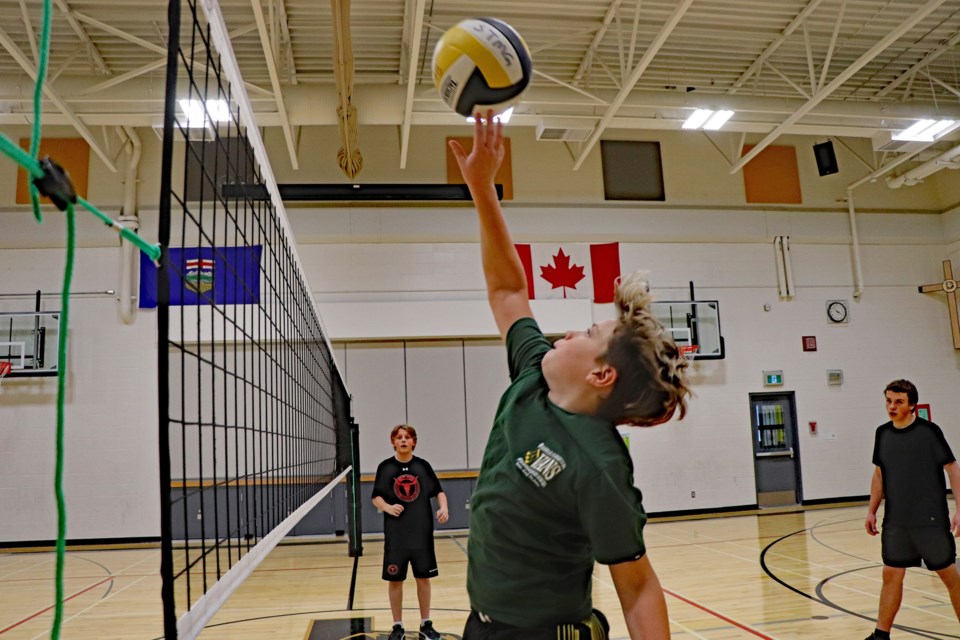 The senior boys volleyball team at Innisfail's St. Marguerite Bourgeoys Catholic School at practice on Oct. 4. The team is off to a good start in its regular season this year as it aims to finish in first place in the Chinook's Edge North Athletic Association. Johnnie Bachusky/MVP Staff