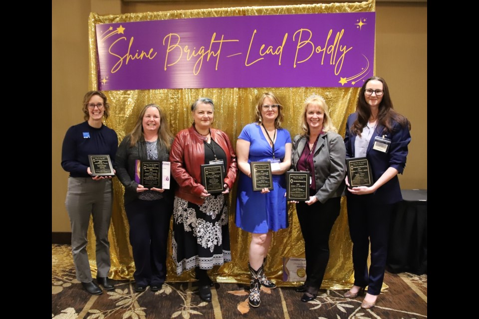 Award recipients pose for a photo. From left are Adrienne Drost of ATB, who accepted  the award for Woman in Agriculture  on behalf of Tietsia Huyzer of Huntcliff Dairy; Rebecca Henderson of Collegiate Sports Medicine who received the Woman In Business award; Dawn Stewart  of  the Didsbury and District Historical Society who received the Woman in Hospitality & Tourism award; Lisa Nicholson of the Hope for MVC Kids Society, who received the Woman In Business Not-For-Profit  award; Stacey Stilling, CEO of Mountain View Seniors' Housing, who was presented with the Woman of Influence award; and Jennifer Shillam of FortisAlberta who received the Woman in Energy award.
Doug Collie/MVP Staff