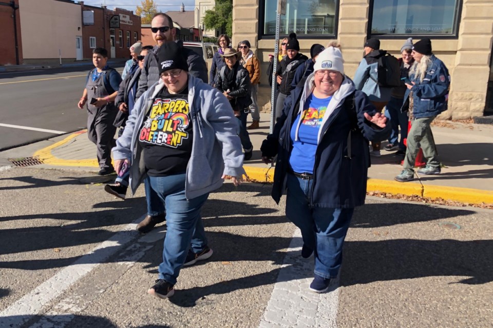 Earpers take part in a walking tour of downtown Didsbury on Thursday. The Wynonna Earp fans came to town as part of the Earptotia Convention.