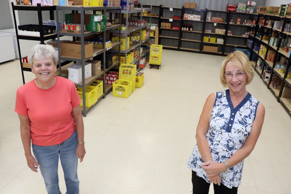 Carole Sim (left) and Brenda Hand, the longtime co-coordinators of the Innisfail and District Food Bank, have both officially retired from their agency coordinator positions. Their retirement was made official on Sept. 21 at the agency's annual general meeting. Johnnie Bachusky/MVP Photo