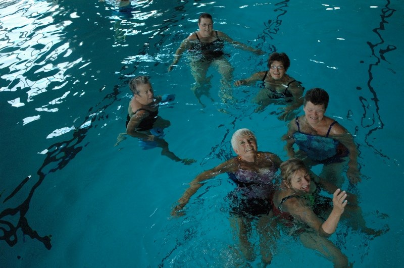 Swimmers enjoy a dip at the AquaPlex