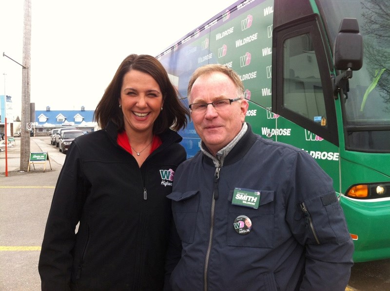 Joe Anglin and his leader Danielle Smith during a stopover in Sundre last week.