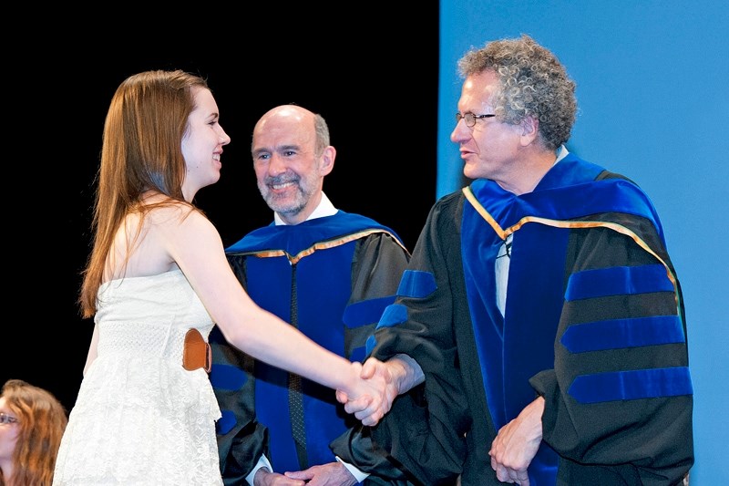 Sundre&#8217;s Hailey Musselman receives congratulations from David Lynch (centre)