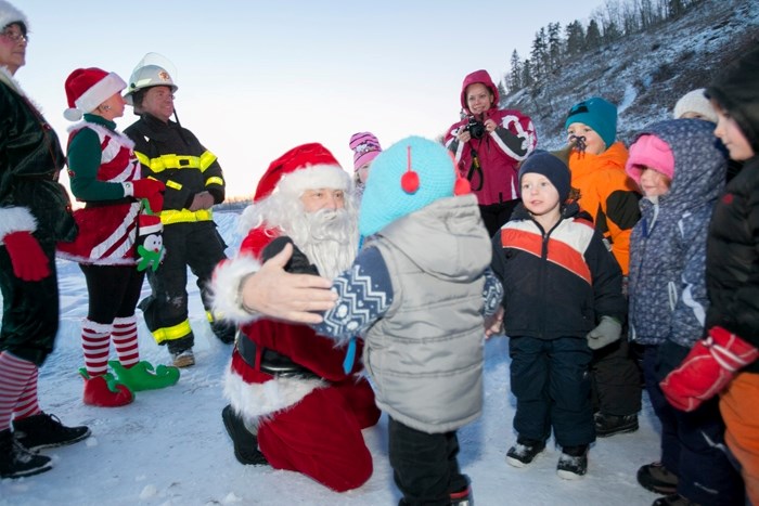 Sundre children flock around Santa Claus following his arrival to town last Friday (Nov. 23) by helicopter for this year&#8217;s Sundown in Sundre. See p. 6 for story and